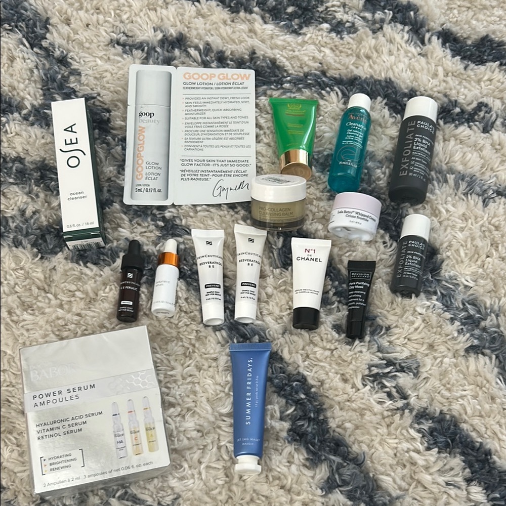 Bundle of travel size serums, cleansers, masks and lotions